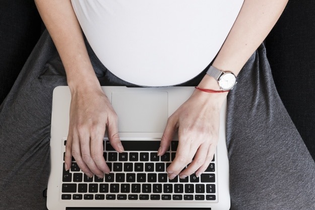 pregnant lady typing